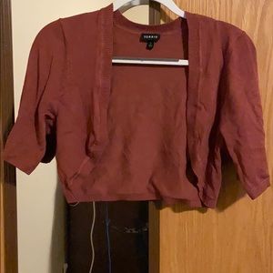 Red cropped cardigan